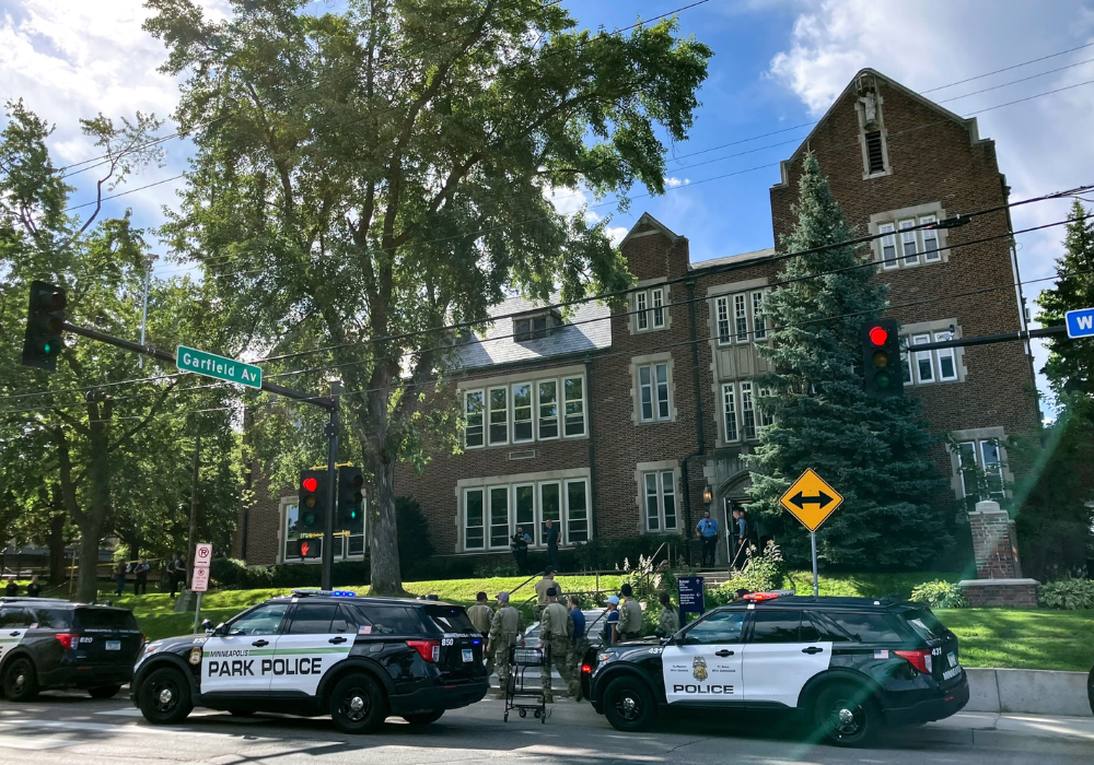 Police and first responders work at the scene of a shooting near Annunciation Church and Catholic School in Minneapolis, Minneosta, on August 27, 2025.